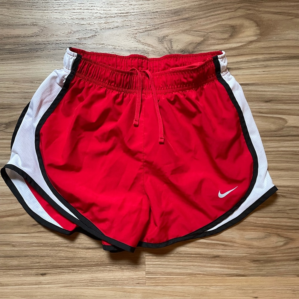 red nike shorts